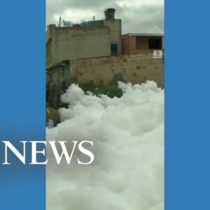 Clouds of toxic foam seen floating on Colombian river