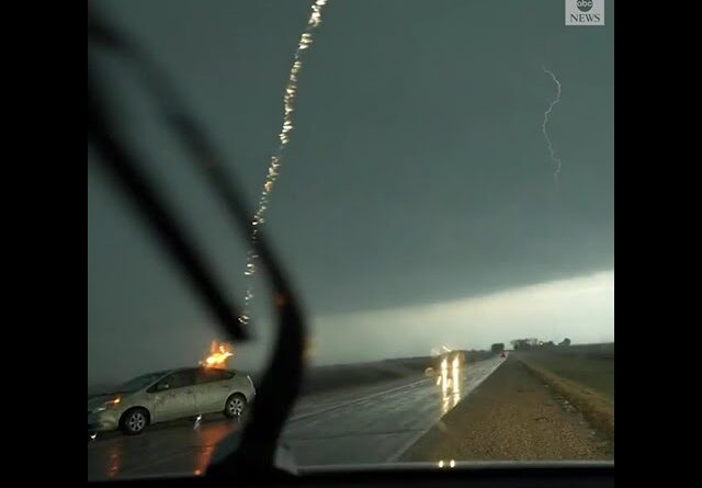 Storm chaser captures moment lightning strikes car in Iowa