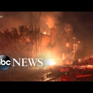 California wildfires burn through coastal neighborhood