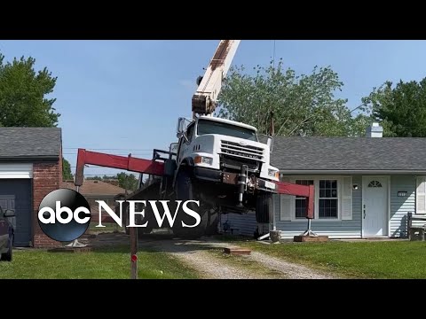 Crane falls through roof of Indiana home