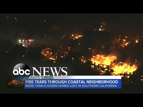 Fire tears through coastal neighborhood