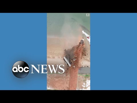 Landmark smokestack in Massachusetts demolished