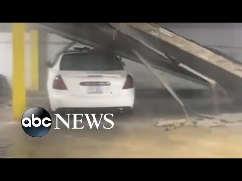 Parking garage partially collapses at apartment complex