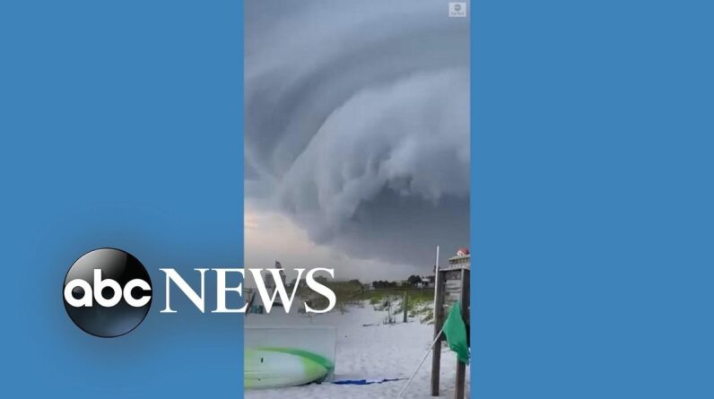 Storm cloud looms over Florida beach