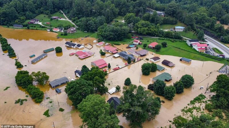 DEADLY FLOODING: A shocking aerial view of homes submerged under flood waters from the North Fork of the Kentucky River in Jackson, Kentucky on July 28.  The governor has warned that the death toll is expected to double and include children.