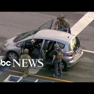 Gunman opens fire from rooftop in Chicago suburb