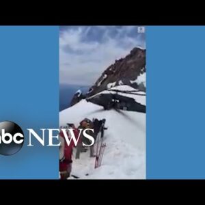 Blackhawk helicopter balances near summit of Mount Hood amid climber rescue