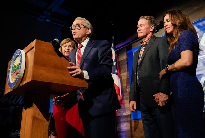 New text messages show Ohio Gov. Mike DeWine, left, and Lt. Gov. Jon Husted, second from right, pushed hard to bail out two nuclear power plants.
