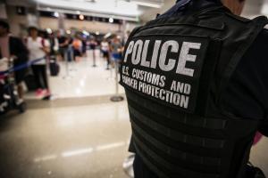 Federal and local law enforcement this morning arrested a Newport News, Va., murder suspect who tried to flee the United States Monday at Washington Dulles International Airport.