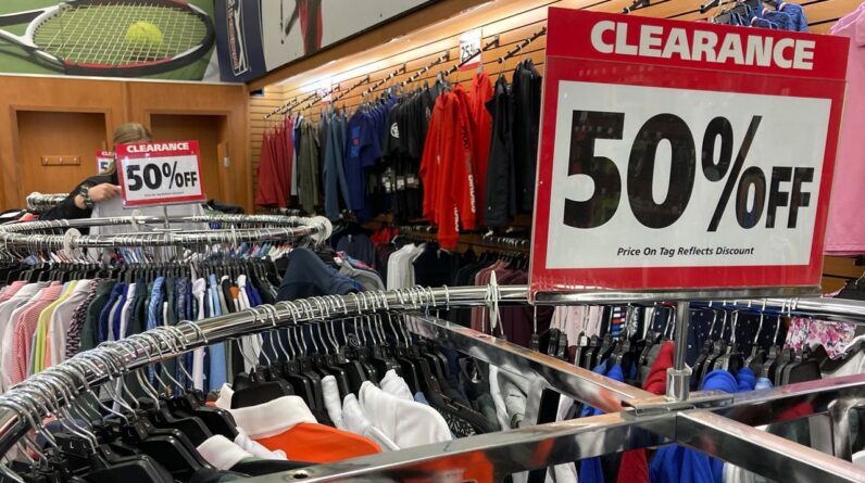 Clearance sale signs are displayed at a retail store in Downers Grove, Ill., on April 26. (AP Photo/Nam Y. Huh)