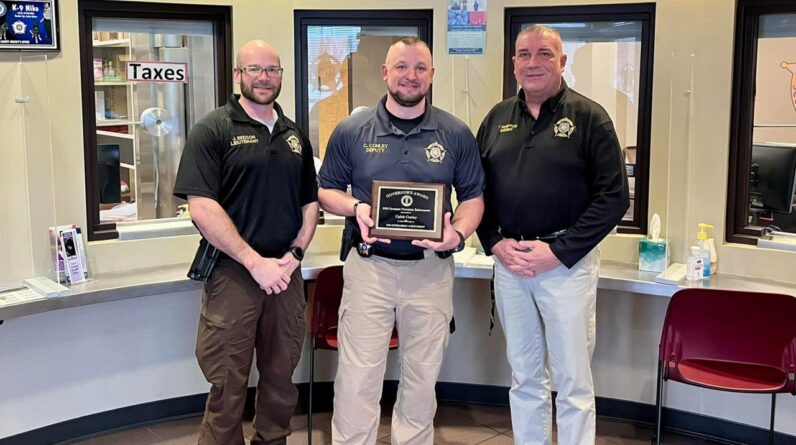 Sheriff's Deputy Caleb Conley (center) has died after being shot during a traffic stop outside of Lexington on May 22, 2023. (Scott County Sheriff's Office)