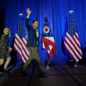 November 8, 2022;  Columbus, Ohio, USA;  Ohio Secretary of State Frank LaRose waves next to his wife, Lauren, as he takes the stage during an election night party for Republican candidates for statewide office at the Renaissance Hotel in downtown Columbus.  Mandatory credit: Adam Cairns-The Columbus Dispatch