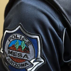 Seen here is a Mesa Police Department badge.