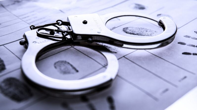 handcuffs and printscroppedjpg 04072022